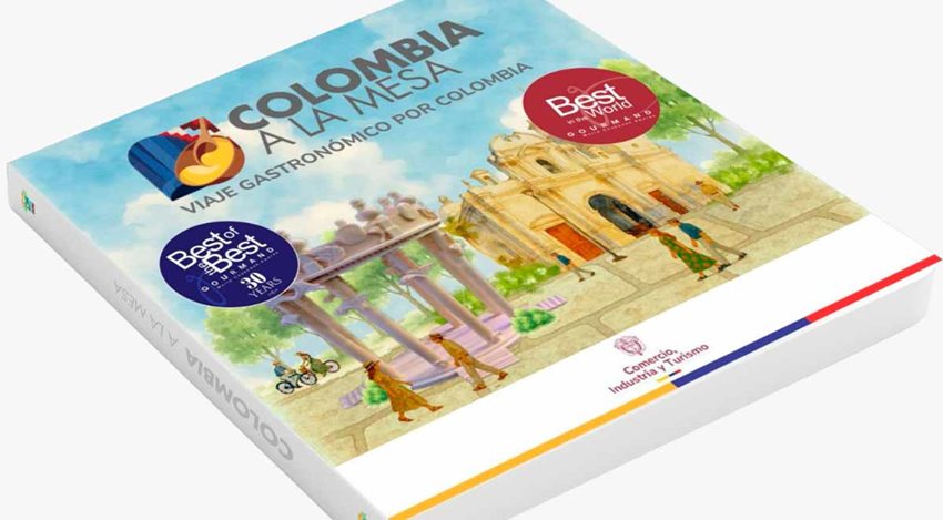 Portada del libro Colombia a la Mesa, con ilustraciones de iglesia y parque de pueblo colombiano.