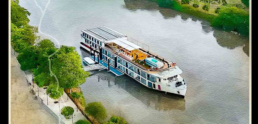 Descripción de la imagen: Fotografía panorámica de crucero en medio del río, con árboles alrededor.