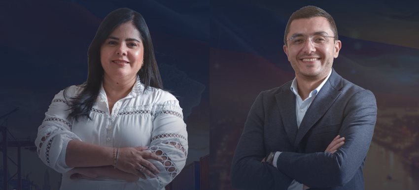 Descripción: Hombre y mujer posando para la foto, con los brazos cruzados y sonriendo.